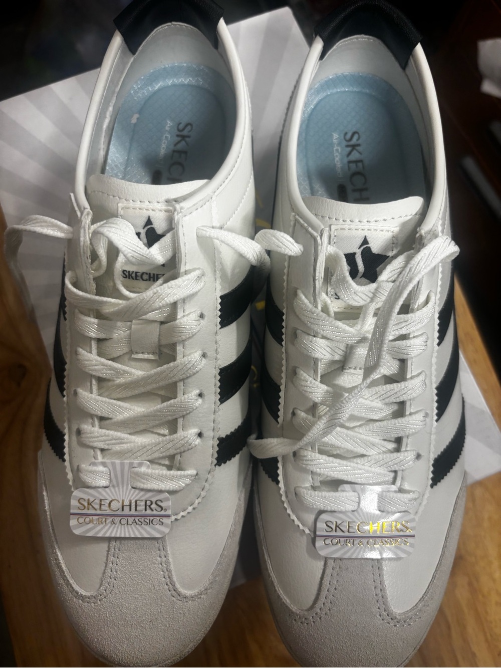 Skechers Men's White Sneakers with Black Stripes